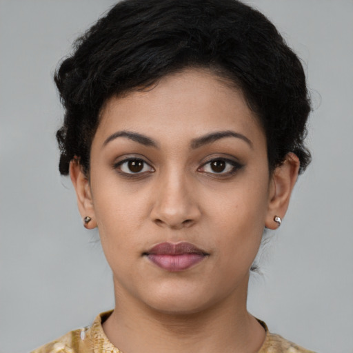 Neutral latino young-adult female with short  black hair and brown eyes