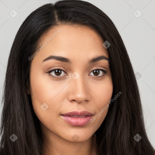 Joyful latino young-adult female with long  brown hair and brown eyes