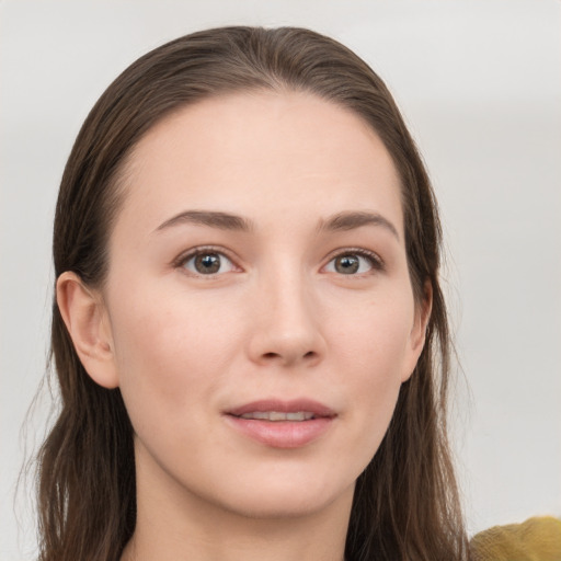 Neutral white young-adult female with long  brown hair and grey eyes