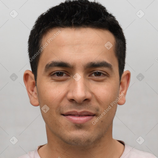 Joyful white young-adult male with short  black hair and brown eyes