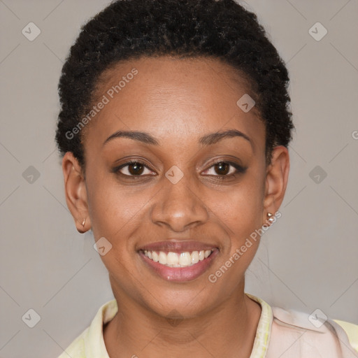 Joyful black young-adult female with short  brown hair and brown eyes