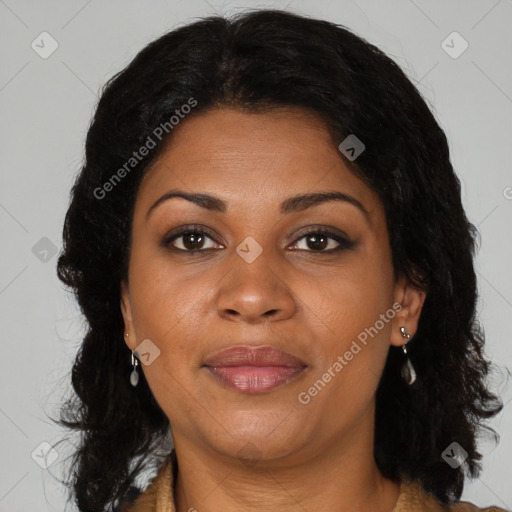 Joyful black adult female with medium  brown hair and brown eyes