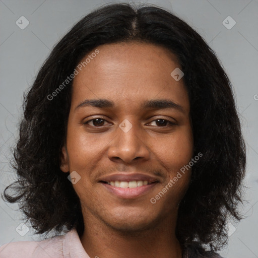 Joyful black young-adult female with medium  brown hair and brown eyes