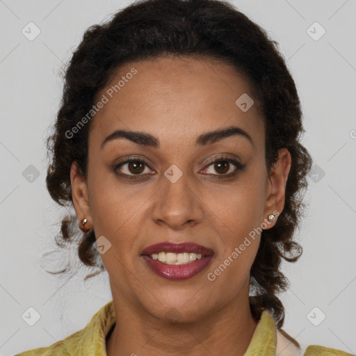 Joyful black young-adult female with medium  brown hair and brown eyes