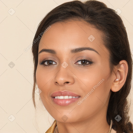 Joyful white young-adult female with long  brown hair and brown eyes