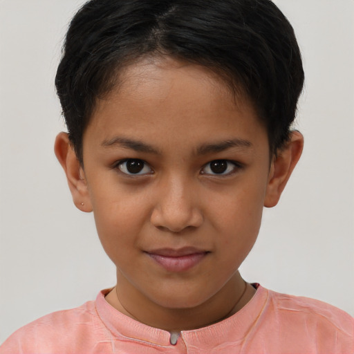 Joyful latino child female with short  brown hair and brown eyes