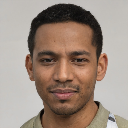 Neutral black young-adult male with short  black hair and brown eyes