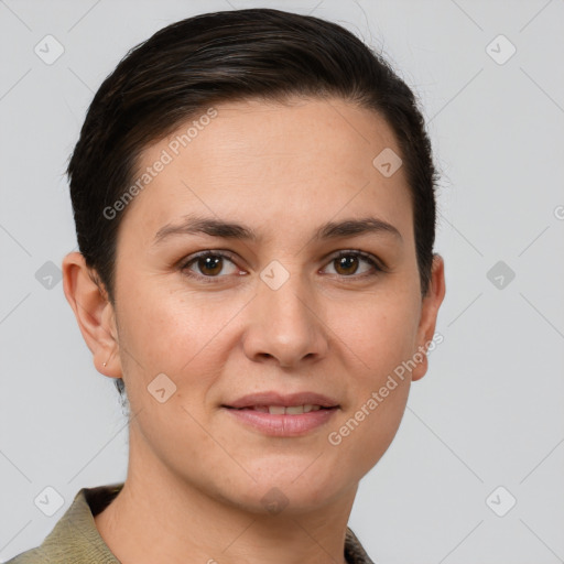 Joyful white young-adult female with short  brown hair and grey eyes