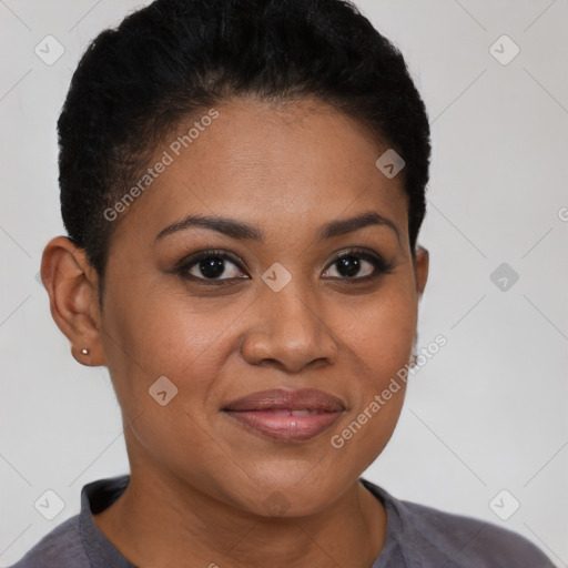 Joyful black young-adult female with short  brown hair and brown eyes