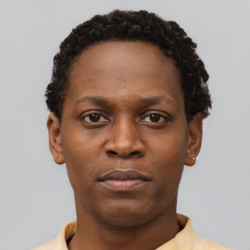 Neutral black young-adult female with short  brown hair and brown eyes