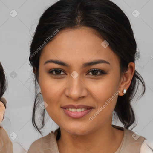 Joyful latino young-adult female with medium  brown hair and brown eyes