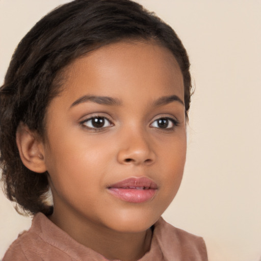 Joyful latino child female with long  brown hair and brown eyes