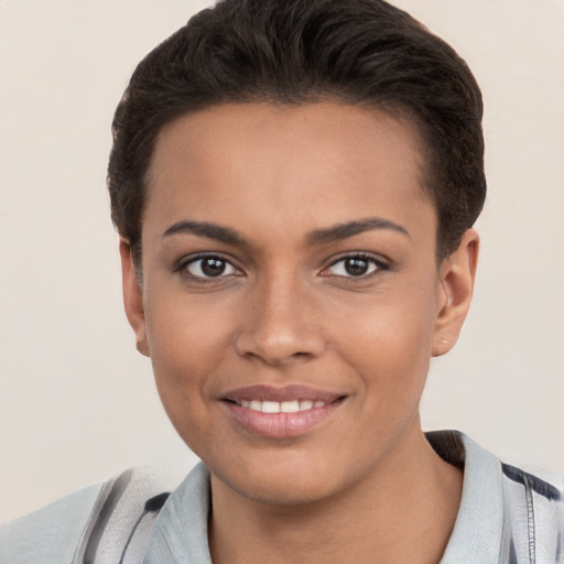 Joyful white young-adult female with short  brown hair and brown eyes