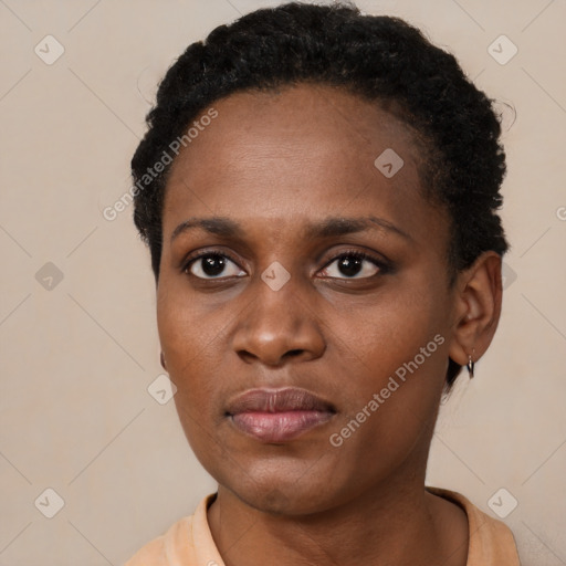 Neutral black young-adult female with short  black hair and brown eyes