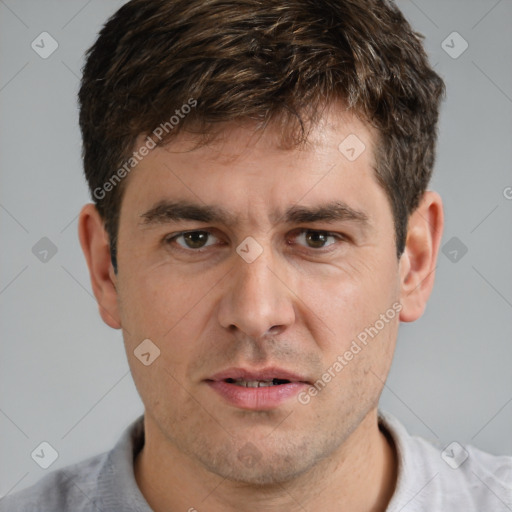 Neutral white adult male with short  brown hair and brown eyes