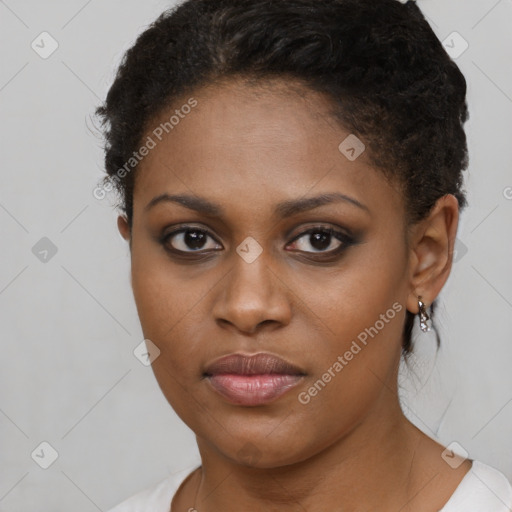 Neutral black young-adult female with short  brown hair and brown eyes