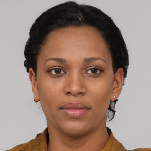 Neutral black young-adult female with short  black hair and brown eyes