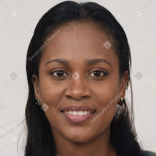 Joyful black young-adult female with long  black hair and brown eyes