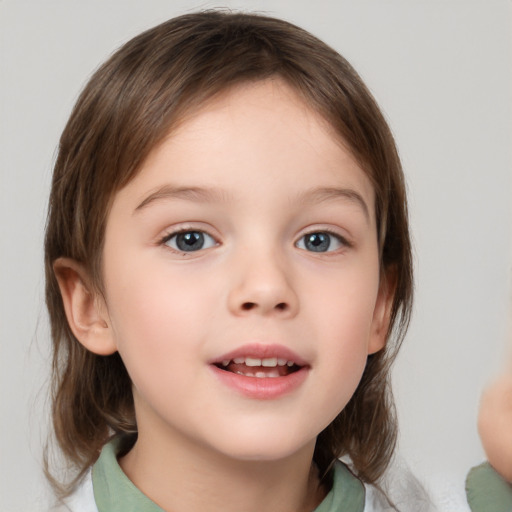 Joyful white child female with medium  brown hair and brown eyes