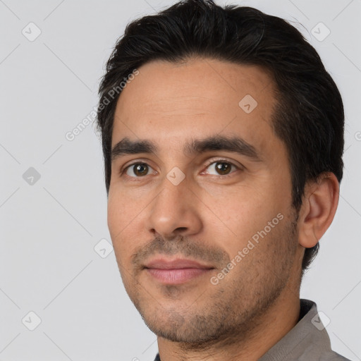 Neutral white young-adult male with short  black hair and brown eyes