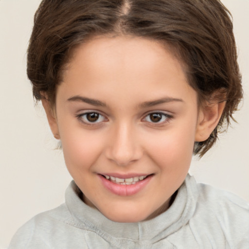 Joyful white child female with medium  brown hair and brown eyes