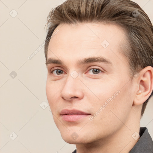 Neutral white young-adult male with short  brown hair and brown eyes