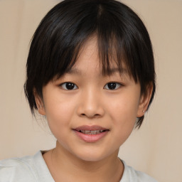 Joyful white child female with medium  brown hair and brown eyes