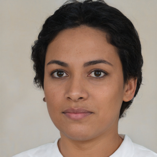 Neutral latino young-adult female with short  brown hair and brown eyes