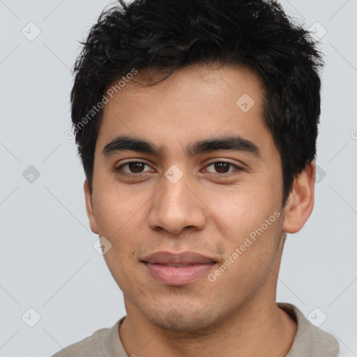 Joyful latino young-adult male with short  brown hair and brown eyes