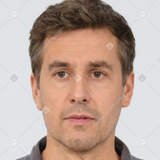 Neutral white adult male with short  brown hair and brown eyes