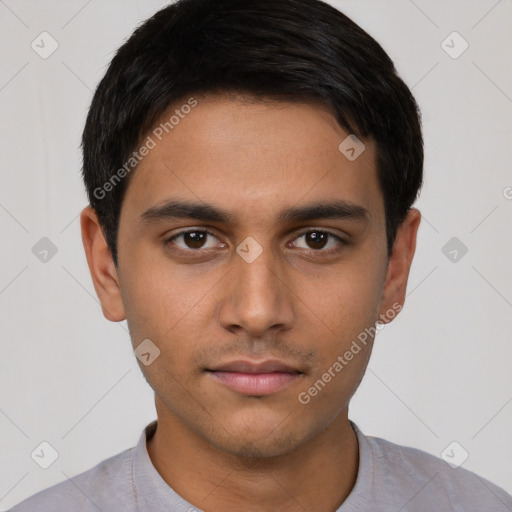 Neutral latino young-adult male with short  brown hair and brown eyes