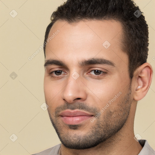 Neutral white young-adult male with short  brown hair and brown eyes