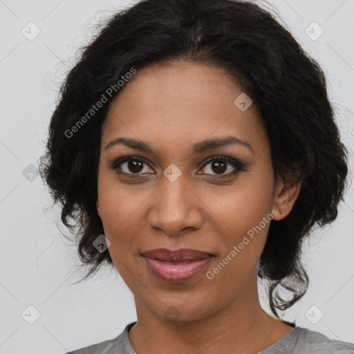 Joyful black young-adult female with medium  brown hair and brown eyes