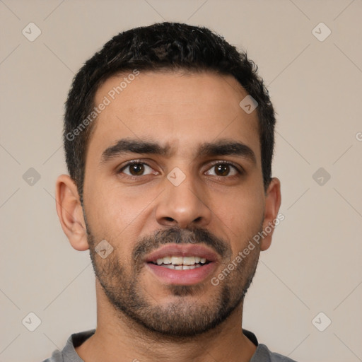 Neutral latino young-adult male with short  black hair and brown eyes