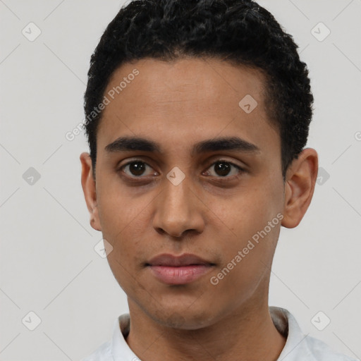 Neutral latino young-adult male with short  black hair and brown eyes