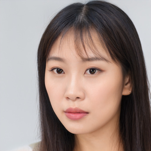 Neutral asian young-adult female with long  brown hair and brown eyes