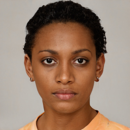 Neutral black young-adult female with short  black hair and brown eyes
