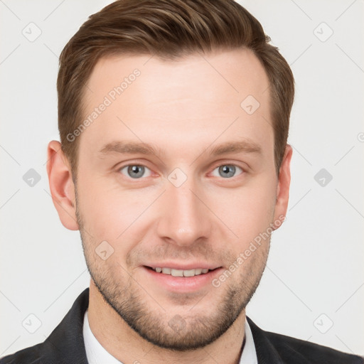 Joyful white young-adult male with short  brown hair and grey eyes