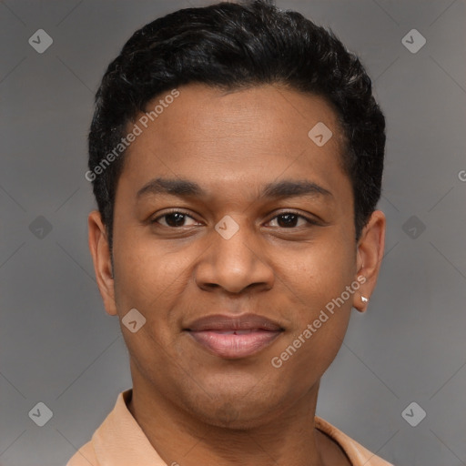 Joyful latino young-adult male with short  black hair and brown eyes