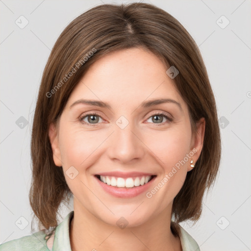 Joyful white young-adult female with medium  brown hair and green eyes