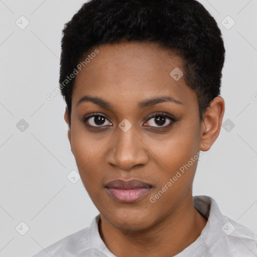 Joyful black young-adult female with short  black hair and brown eyes