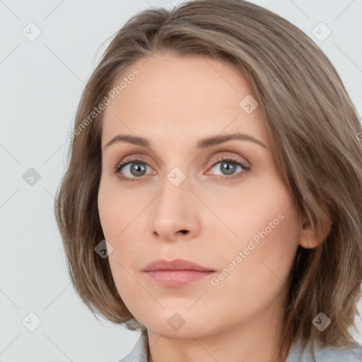 Neutral white young-adult female with medium  brown hair and grey eyes