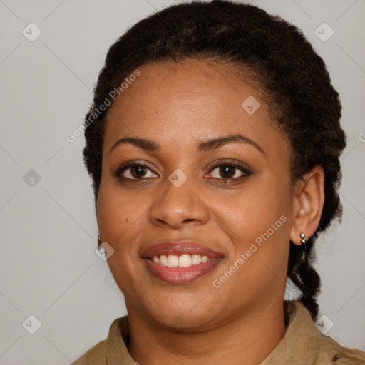 Joyful latino young-adult female with short  brown hair and brown eyes