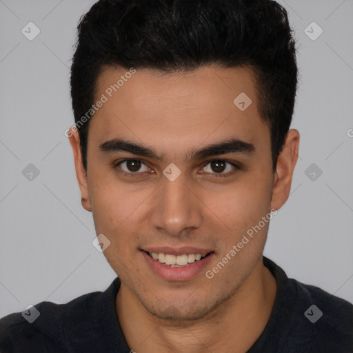 Joyful latino young-adult male with short  brown hair and brown eyes