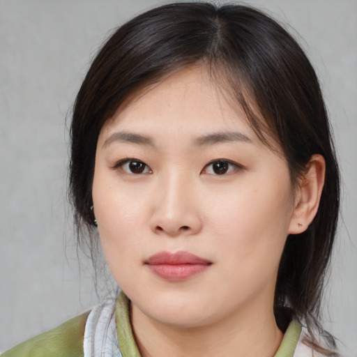 Neutral white young-adult female with medium  brown hair and brown eyes