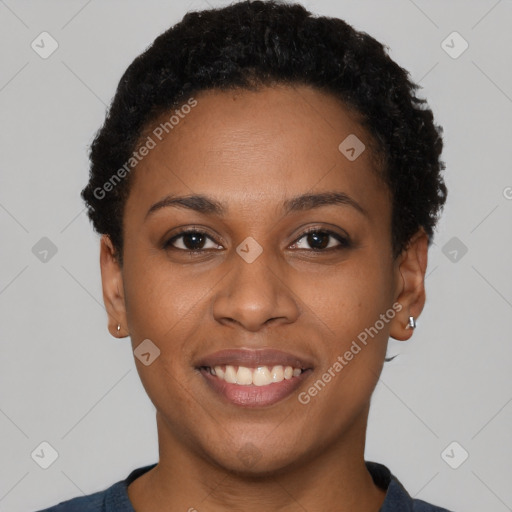 Joyful black young-adult female with short  brown hair and brown eyes