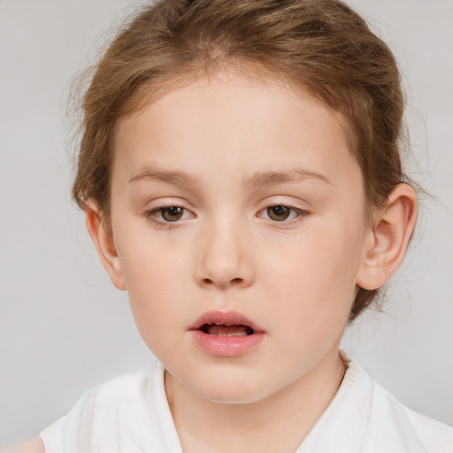 Neutral white child female with short  brown hair and brown eyes