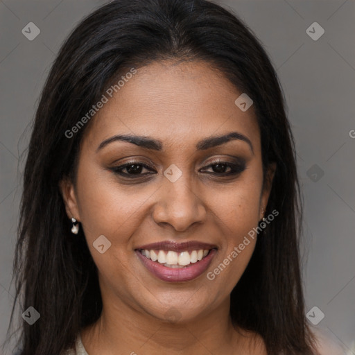 Joyful latino young-adult female with long  brown hair and brown eyes