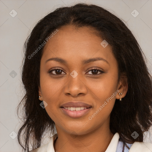 Joyful black young-adult female with long  brown hair and brown eyes