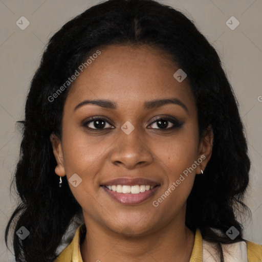 Joyful black young-adult female with long  brown hair and brown eyes